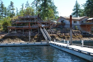 The Seattle Yacht Club outstation at Cortes Bay.  This is the crown jewel in the SYC outstations.  At upper right is the home of the outstation manager; at left is the BBQ deck.