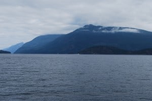 Cruising across Desolation Sound, heading north along the east side of Cortes Island.  This looks like a huge expanse of water - because it is.  Capt. George Vancouver named this Desolation Sound back in the 1700s during his exploration of the area.  It was dreary and rainy, and he felt desolate here.  Now, it's one of the most popular cruising areas in the world.  As soon as we approach the land up ahead we'll be in Lewis Channel and it narrows down to about 1/2 mile width.