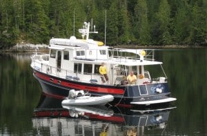 This is a photo from out of the past - Cosmo Place anchored in the very secluded O'Brien Bay in Simoom Sound 2007.  After one night in here all to ourselves, another Nordic Tug 42 pulled in - Abacus - and we became friends with Barrie and Ann Graf.  Barrie took this photo, probably the best one we have of Cosmo Place.