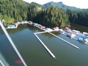 An aerial view of Sullivan Bay Marine Resort (taken from their web site) - obviously at a slack time, as there are no boats on their docks.  The cluster of resort buildings are in the U at upper left, and the float homes are on the right.  We tied up between two float homes across the dock from us at the middle right edge.  There are large fuel tank on shore to the left for refueling boats and floatplanes, but access to the shore is not available to cruising boaters.