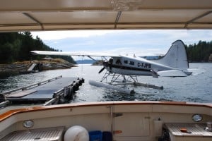 Shortly after we arrived, the first of the day’s floatplanes – a de Havilland Otter, the standard floatplane in these parts – came in with several passengers.  This is the closest place for cruising boats in Desolation Sound to pick-up and drop off guests.  Most of the floatplane pilots are in their 20s, and they really know their airplanes - when this one docked, he had to overlap his wing with our cockpit, and the tip was less than 5' from our upper deck.