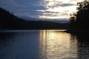 Sunrise clouds as Flying Colours exits Cortes Bay.